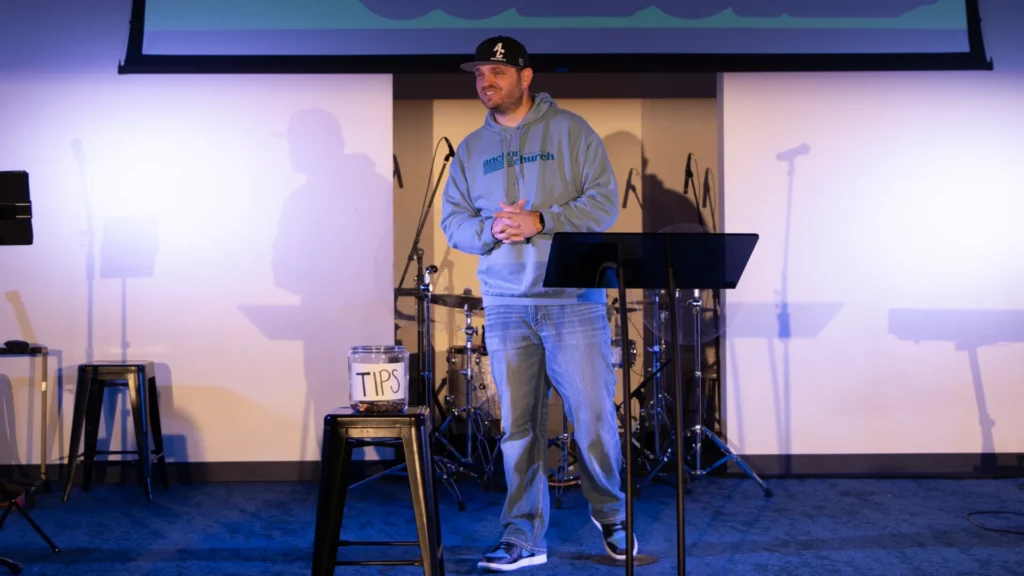 Pastor Alex Graves preaching “Tipping Culture” at Anchor Church, teaching that God isn’t our waiter but our provider, and that tithing is an act of trust and obedience.