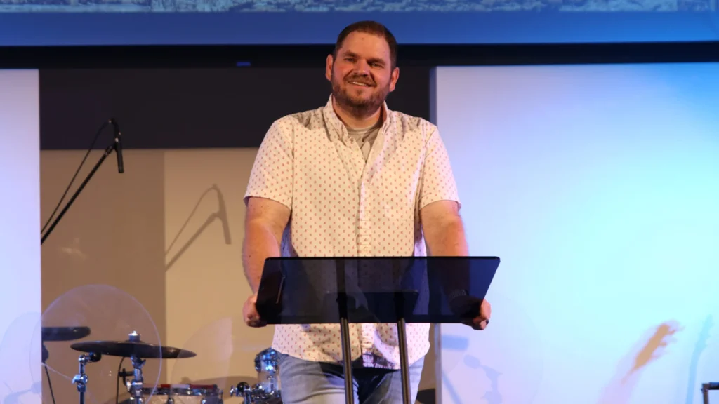 Pastor Alex Graves preaching "The Burden that Builds," the first message in the Against the Odds series at Anchor Church, exploring Nehemiah's God-given burden to rebuild Jerusalem and how God still rebuilds broken lives today.